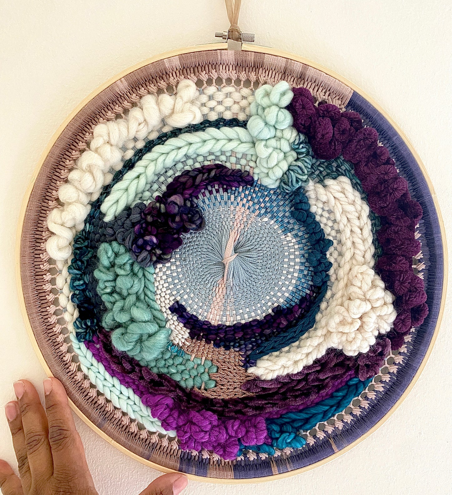 Plum clouds round woven wall hanging