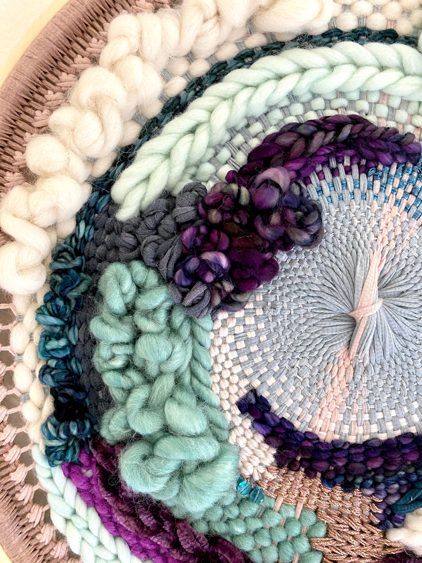Plum clouds round woven wall hanging