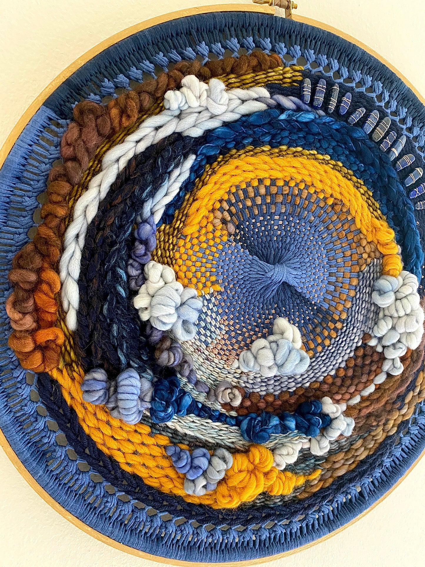 “Water stones" round woven wall hanging