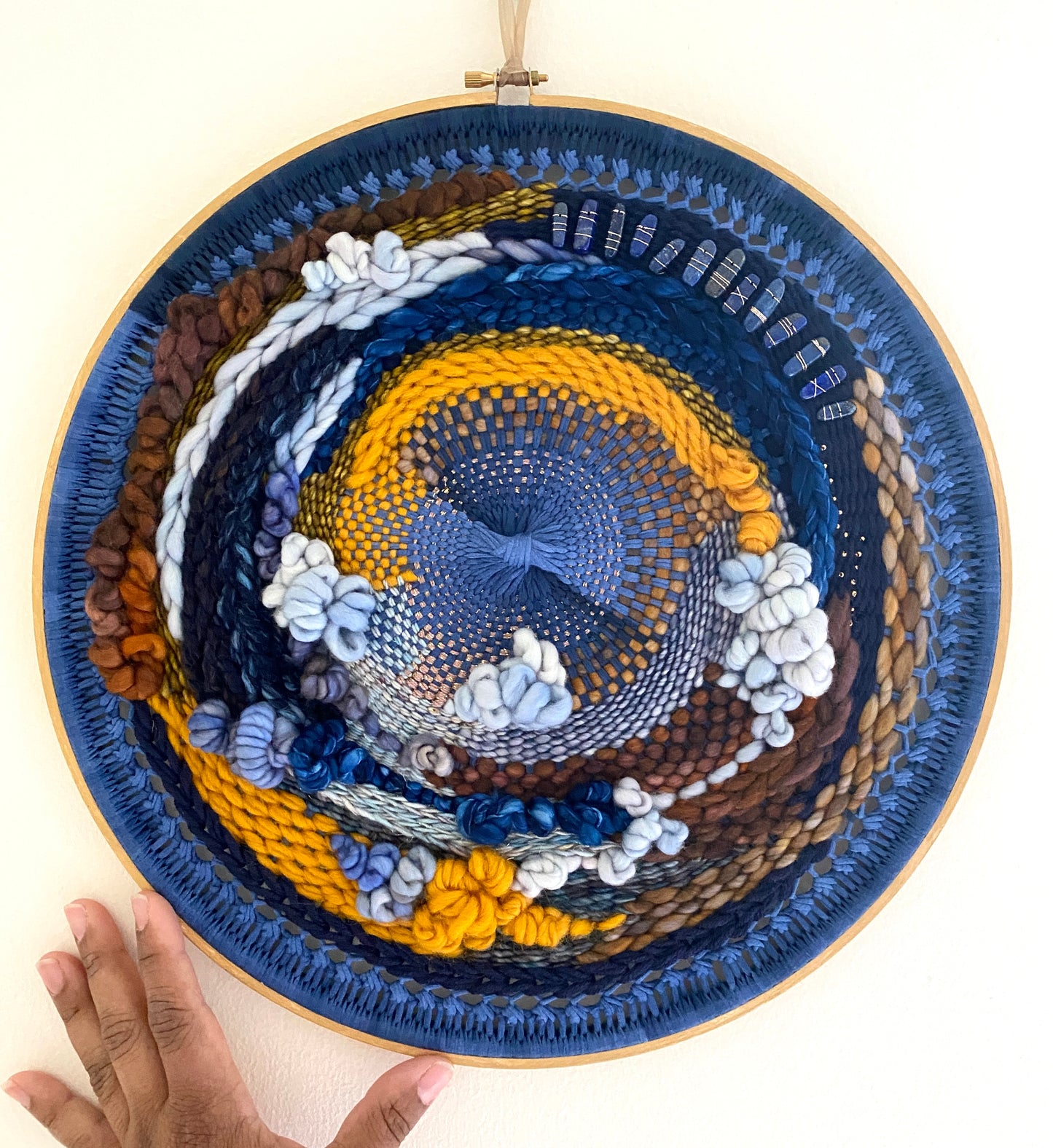 “Water stones" round woven wall hanging