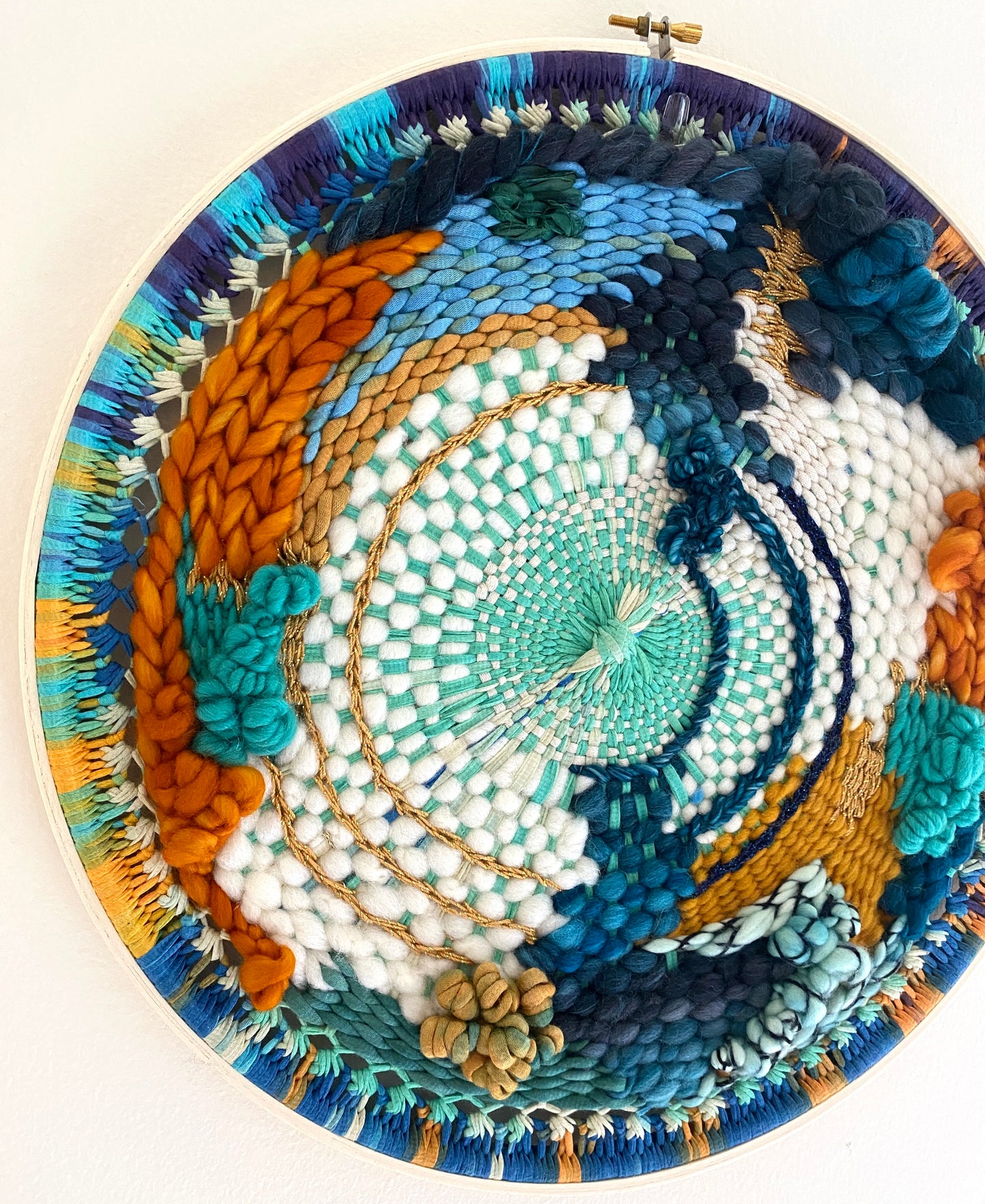 "Journey" round woven wall hanging