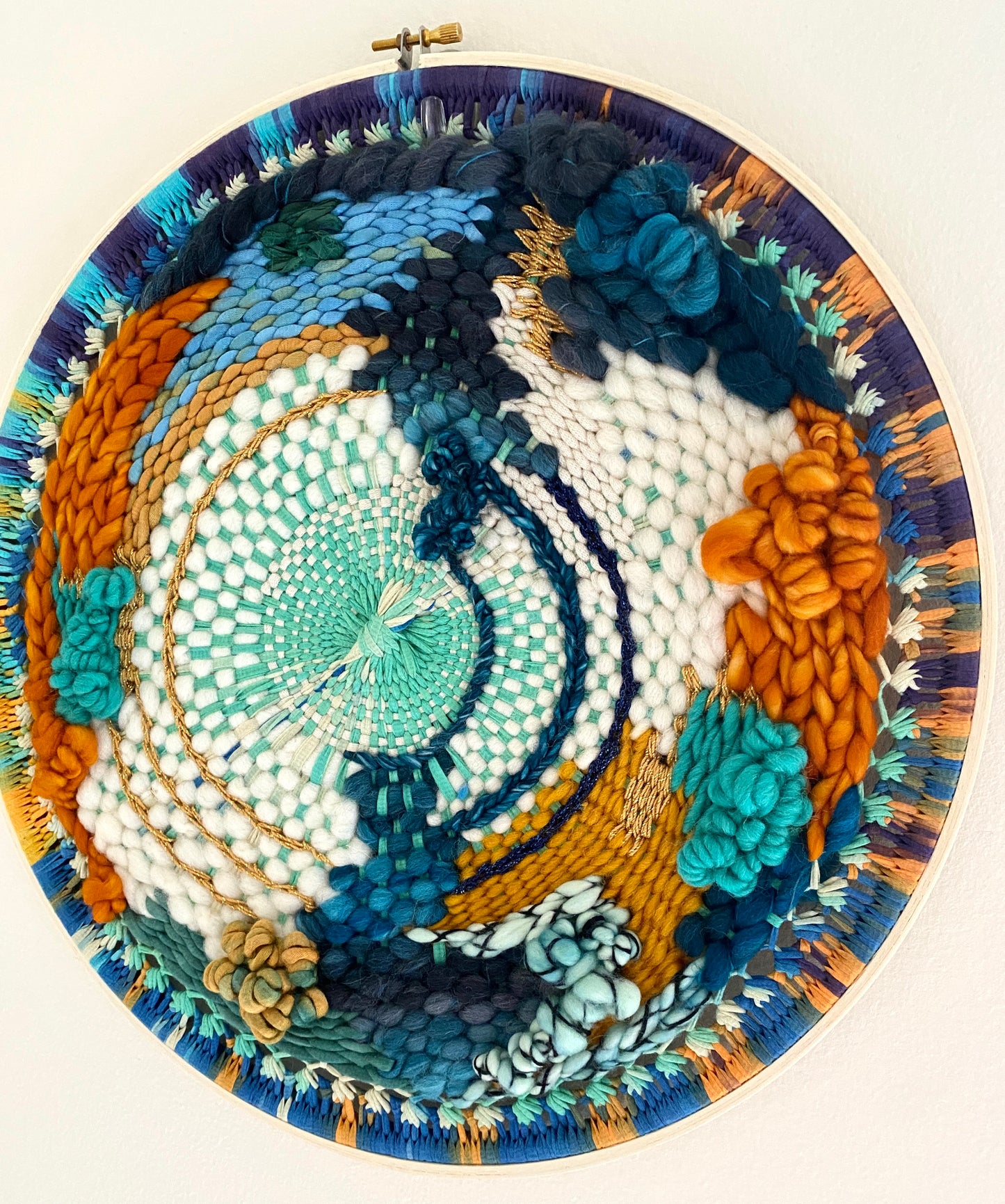 "Journey" round woven wall hanging